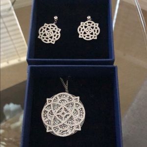 Swarovski brand set, earrings and pendant.
